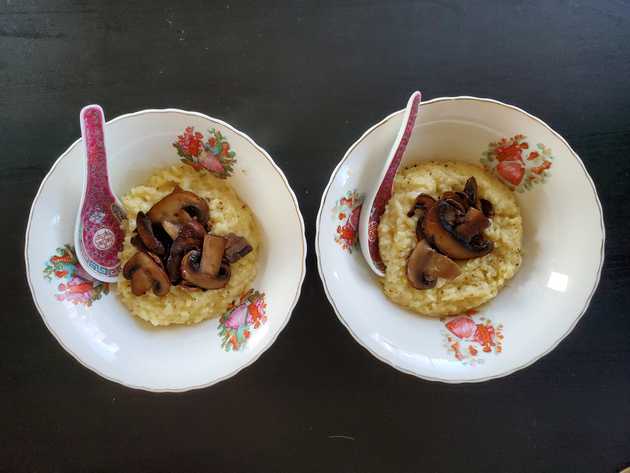 Mushrooms delicately placed on risotto