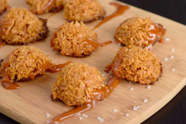 Close up of salted caramel macaroons with caramel drizzle