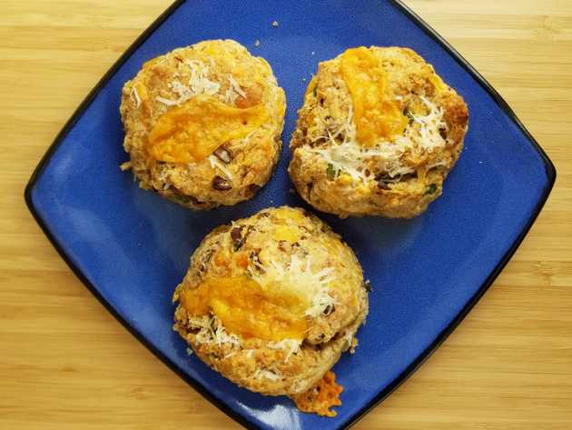 Three cheesy mushroom onion biscuits, plated